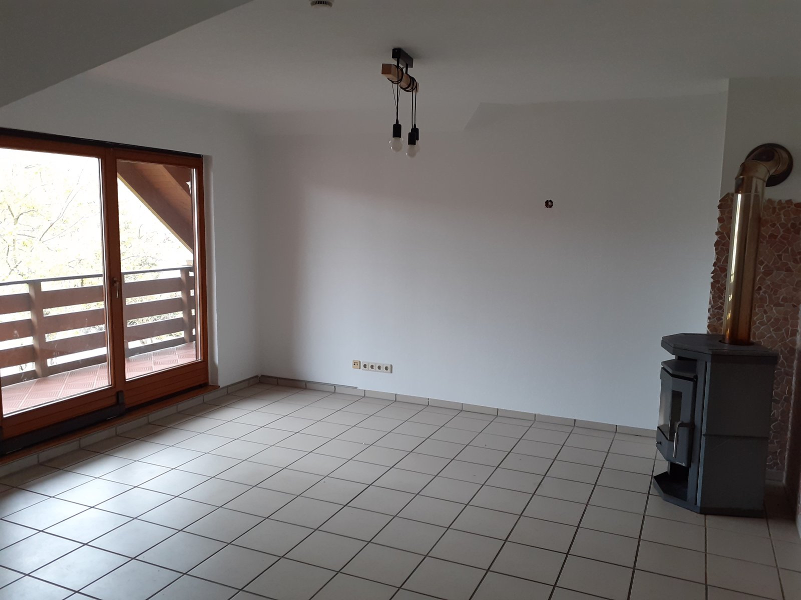 Wohnzimmer mit Kaminofen